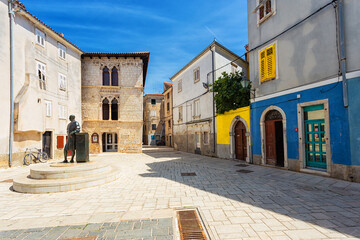street scene with old houses in the town of Cres, Island of Cres, Kvarner, Croatia.