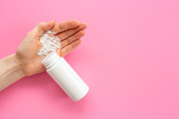 Applying white talcum powder on hand. Skin care cosmetic