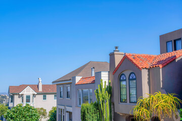 Sloped row of houses against the clear sky background at San Francisco, California