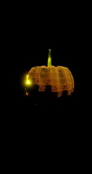 Bright eyes and crooked smile lit on the face of a Halloween pumpkin