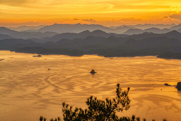 sunset over the Thousand Islands Lake, Zhejiang, China