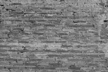Black and white texture background, red brick mortar wall, layered construction of house flap.