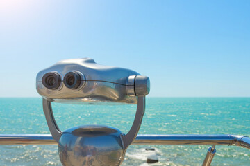 Observation deck with binocular to view the ocean sea.