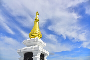 Fototapeta na wymiar Pagoda Wat Pa Ban Tat temple, Gold temple with beautiful cloudy in Udon Thani Thailand.