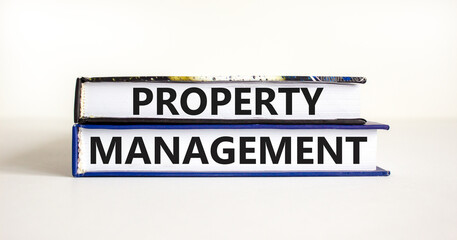 Property management symbol. Concept words Property management on books on a beautiful white table white background. Business property management concept. Copy space.