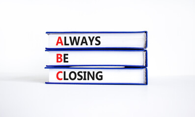 ABC always be closing symbol. Concept words ABC always be closing on books on a beautiful white...
