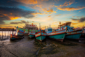 The scenery of fishing boats and the evening sky,Fishing trawler at sunset,Main port for travel...