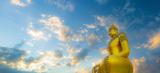 Golden buddha,Big Buddha statue outdoors,The giant golden Buddha. The large buddha statue with...