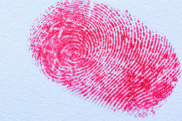 Red finger,Fingerprint made with blood on white background, top view