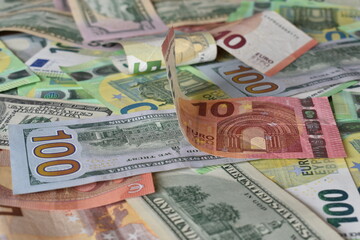 Fototapeta na wymiar money mixed euro and dollar bills