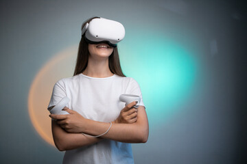 attractive female weared virtual reality augmented reality glasses enjoys metaverse 