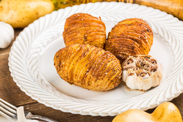 There are delicious baked potatoes on the plate