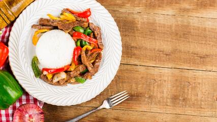 A plate of fried beef rice with green pepper