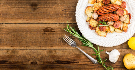 A plate of delicious potatoes and baked sausage