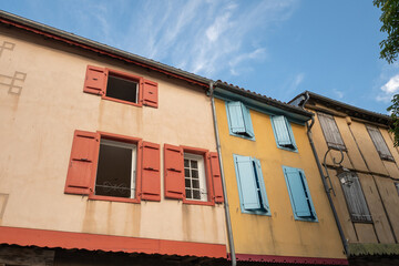 Old framework houses at main square of medieval village Mirepoix in southern France