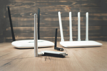 Different types of Wi-Fi routers, modern and old technology. Wireless ethernet connection signal....