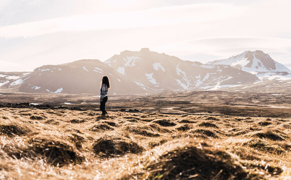 Woman Meditating In The Landscapes Of Iceland