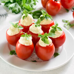 Tomatoes stuffed with cream cheese