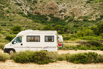 Caravan camping on mediterranean coast.