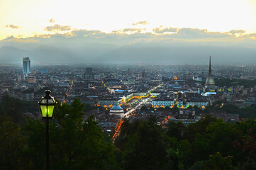 Panoramic scenic view of city downtown from the hill at sunset Turin Italy