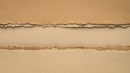 paper abstract in earth tones with a copy space - sheets of handmade paper,  blank web banner