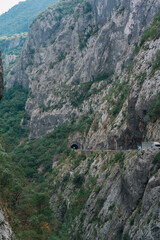Obraz premium the gorge between the mountains where the highway runs along the Moraca River, Montenegro