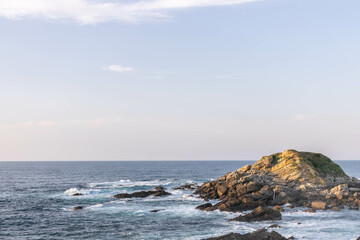 Fototapeta na wymiar Background of a sea breaking in a cliff