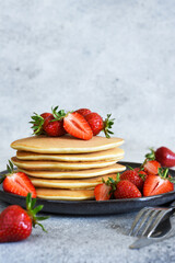 Stack of honey pancakes, homemade strawberry pancakes for breakfast