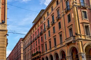 Fototapeta premium Building facades and medieval architecture along the streets in Bologna