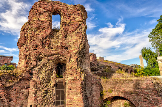 City gates and medieval architecture at the northwestern entrance to the Parco della Montagnola in Bologna Italy
