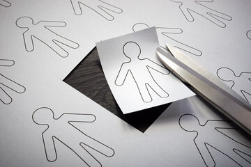 Cancel culture concept. Figurine of a human carved from a sheet.