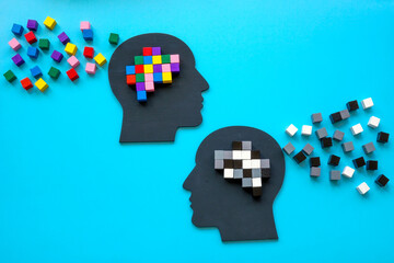 Positive and negative mindset concept. Heads with colorful cubes. - obrazy, fototapety, plakaty
