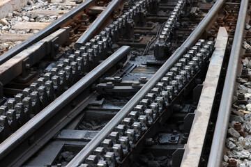 Cog railway tracks with an additional toothed rack located in the middle of the track to overcome...