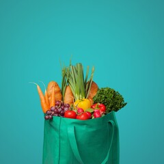 Shopping bag full of fresh groceries, grocery shopping concept on background