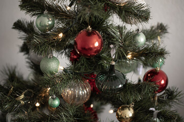 Close-up of Christmas balls on a Christmas tree.
