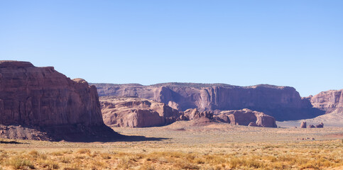 Desert Rocky Mountain American Landscape. Morning Sunny Sunrise Sky. Oljato-Monument Valley, Utah, United States. Nature Background