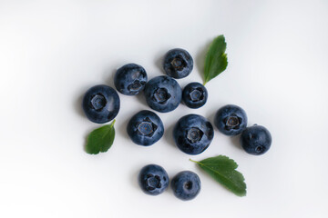 Fresh blueberries on a light background
