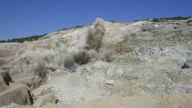 explosion at open mine with dynamite
