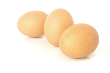 Fresh eggs are isolated on white background.