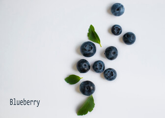 Fresh blueberries on a light background