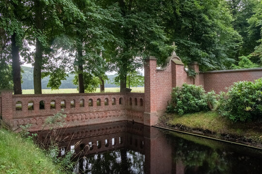 June 25th, 2022, Westmalle, Belgium, view of the moat and wall around the abbey of Westmalle, famous for its blonde, brown and trippel trappist beer. High quality photo