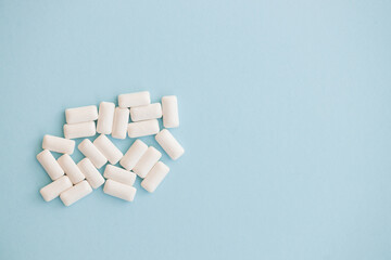 white chewing gum on blue background