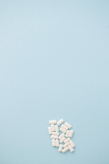 white chewing gum on blue background