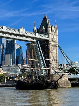 London/City of London/England - 08082022: Swedish ship G&ouml;theborg sails on River Thames under Tower Bridge with its bascules completely open