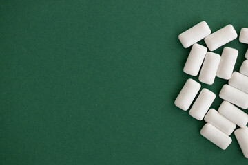 white chewing gum on green background