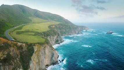 Picturesque, untouched beauty of tranquil seascape at Pebble Beach, West Coast. World famous scenic drive by Big Sur nature park, Bixby bridge. High quality 4k footage
