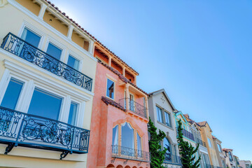 Row of three-storey mediterranean houses in San Francisco, CA