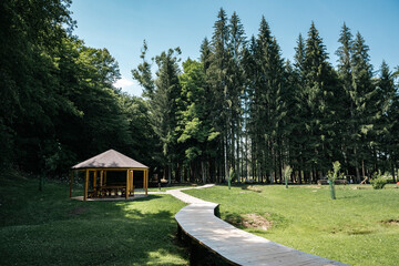 Beautiful visitor center of Baraceve caves, outdoor park for gathering of the tourist groups