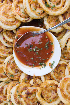 Buffet With Pizza Snails And Ketchup Sauce