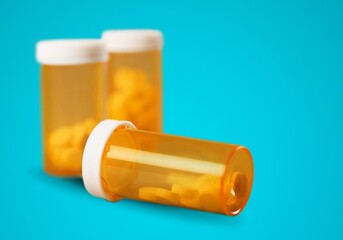 Set of pills in RX prescription drug bottle